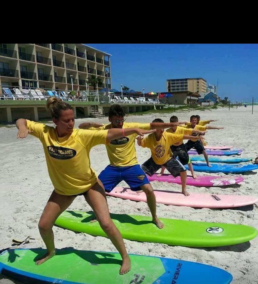 Surf camp pop-up practice