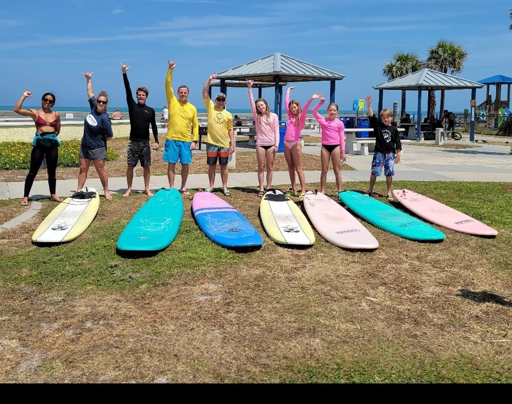 Group surf camp on the beach in Daytona Beach